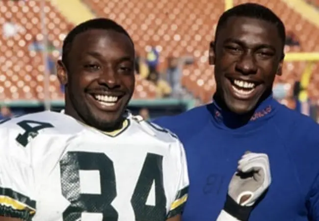 Sterling Sharpe (R) with his younger brother Shannon Sharpe (L)