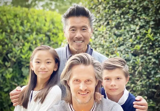 Craig Koch with his husband Vern Yip and kids