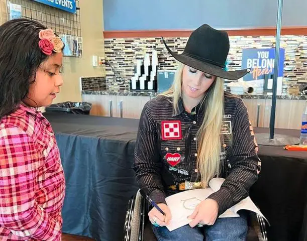 Amberley Snyder with a fan