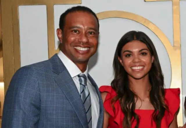 Sam Alexis Woods with her father Tiger Woods