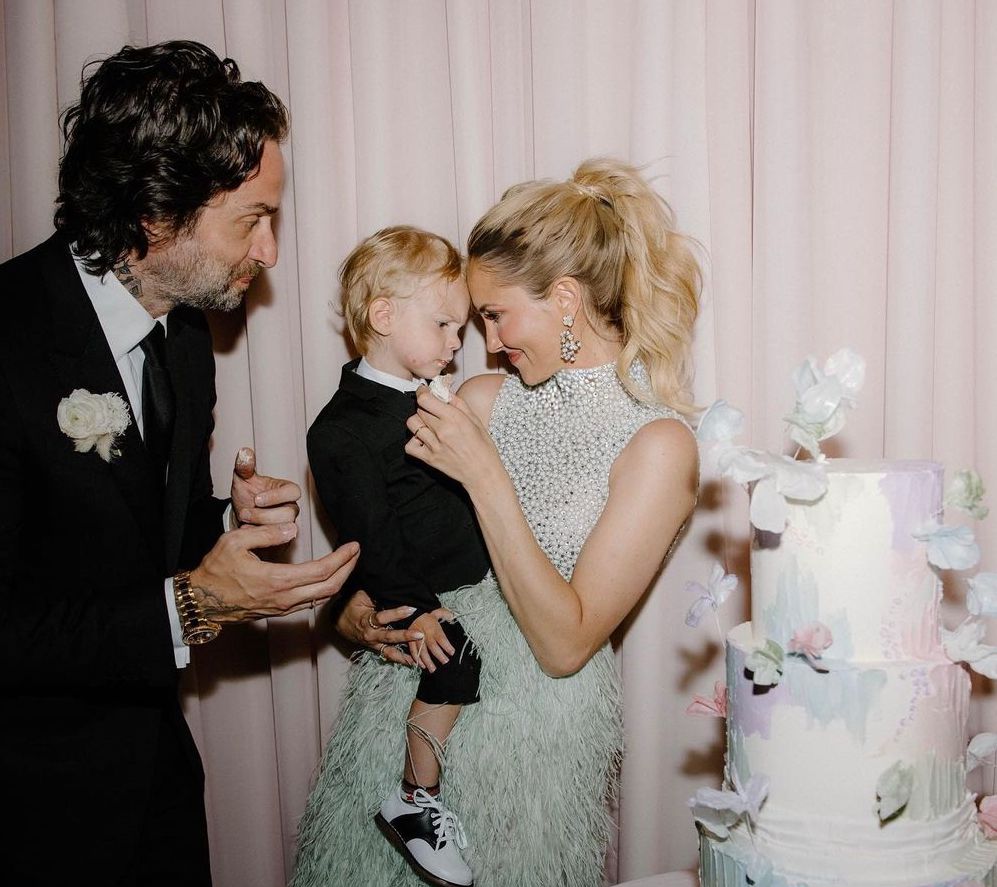 Kristin Taylor, Chris D'elia and their son Calvin on their wedding day