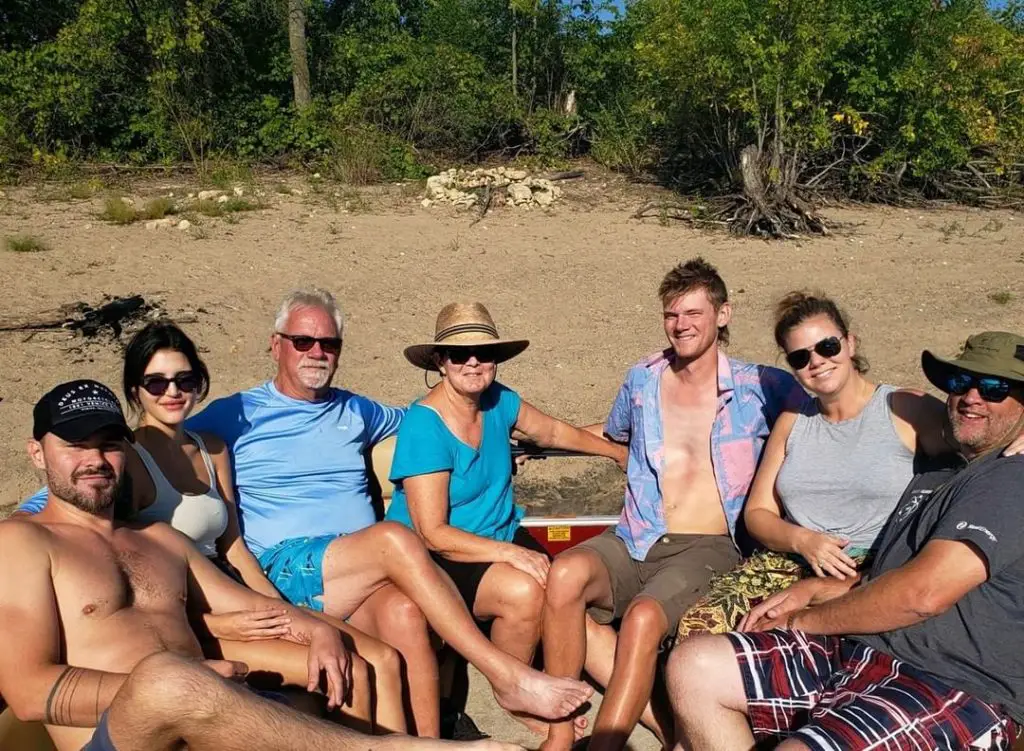 Patrick Flueger with his girlfriend Reem, parents, and siblings