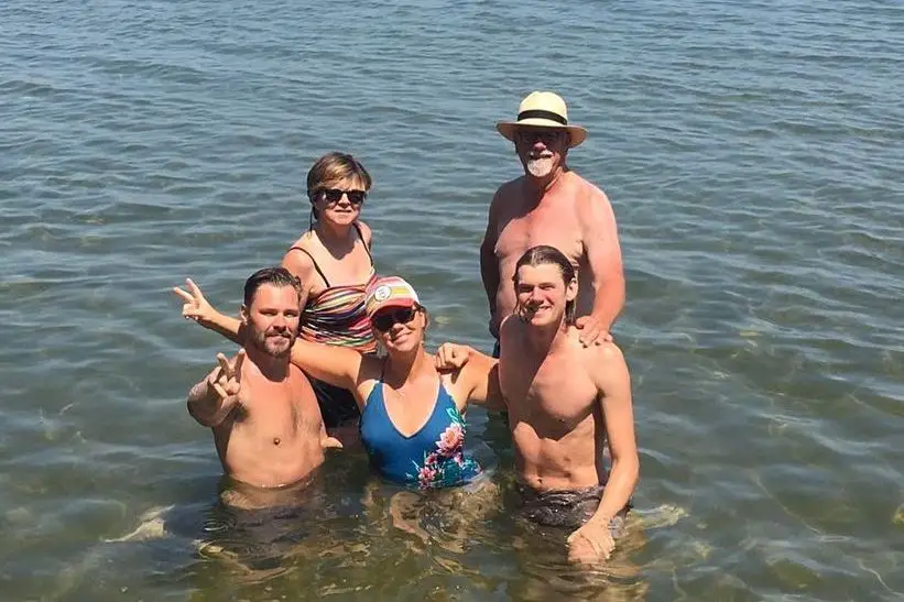 Patrick Flueger with his parents and siblings