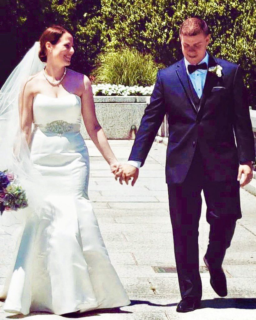 Erin Perrine and husband Nicholas Perrine on their wedding day.