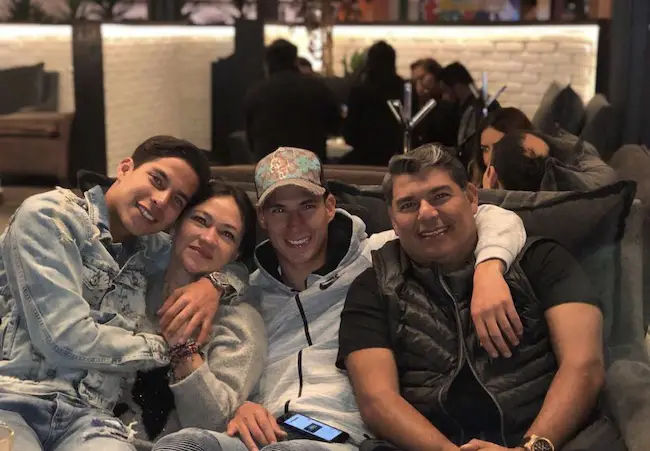 Diego Lainez with his parents and brother