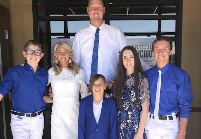 Shawn Bradley with his wife and children