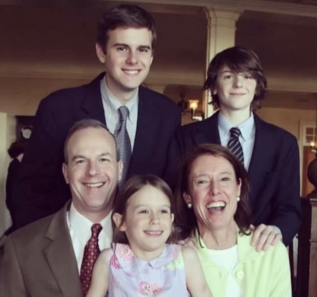 Young Guy Benson with his family