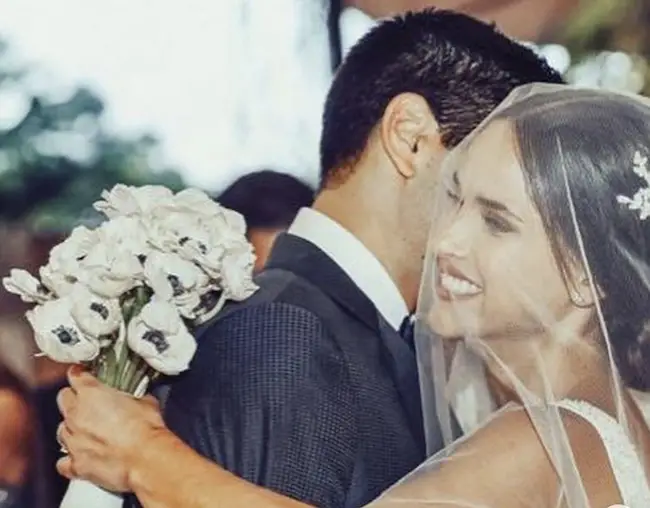 Edgardo Canales and his wife Adria Arjona on their wedding day