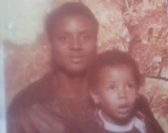 three years old Rodney with his father