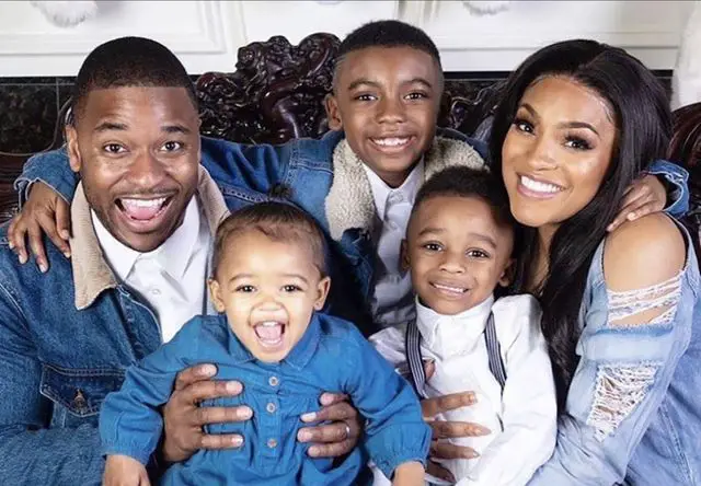 Drew Sidora with her husband and children