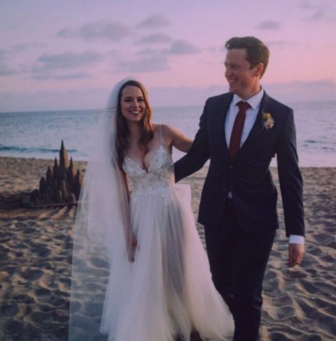 Griffin Cleverly with his wife Bridgit Mendler on their wedding day