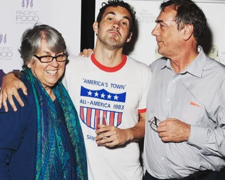 Mark Normand with his parents