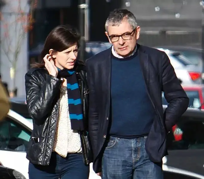 Rowan Atkinson with his partner Louise Ford